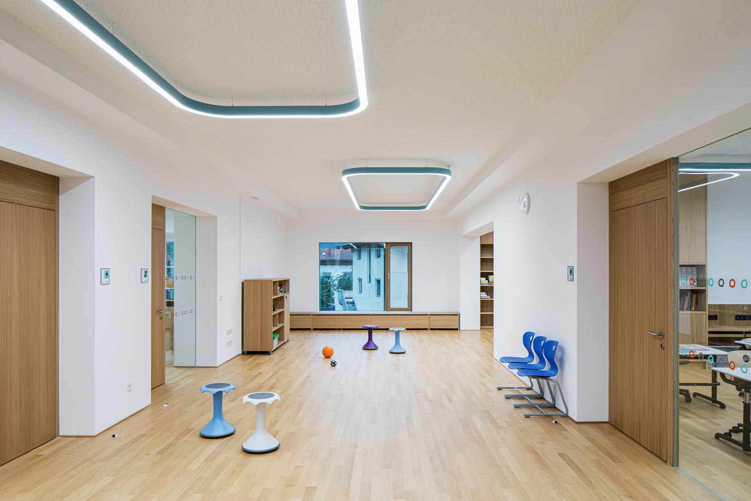 Blue LED ceiling lighting for modern classrooms in the primary school