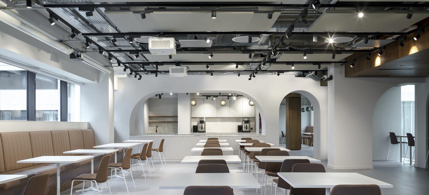 Modular profile system as ceiling lighting in a canteen.