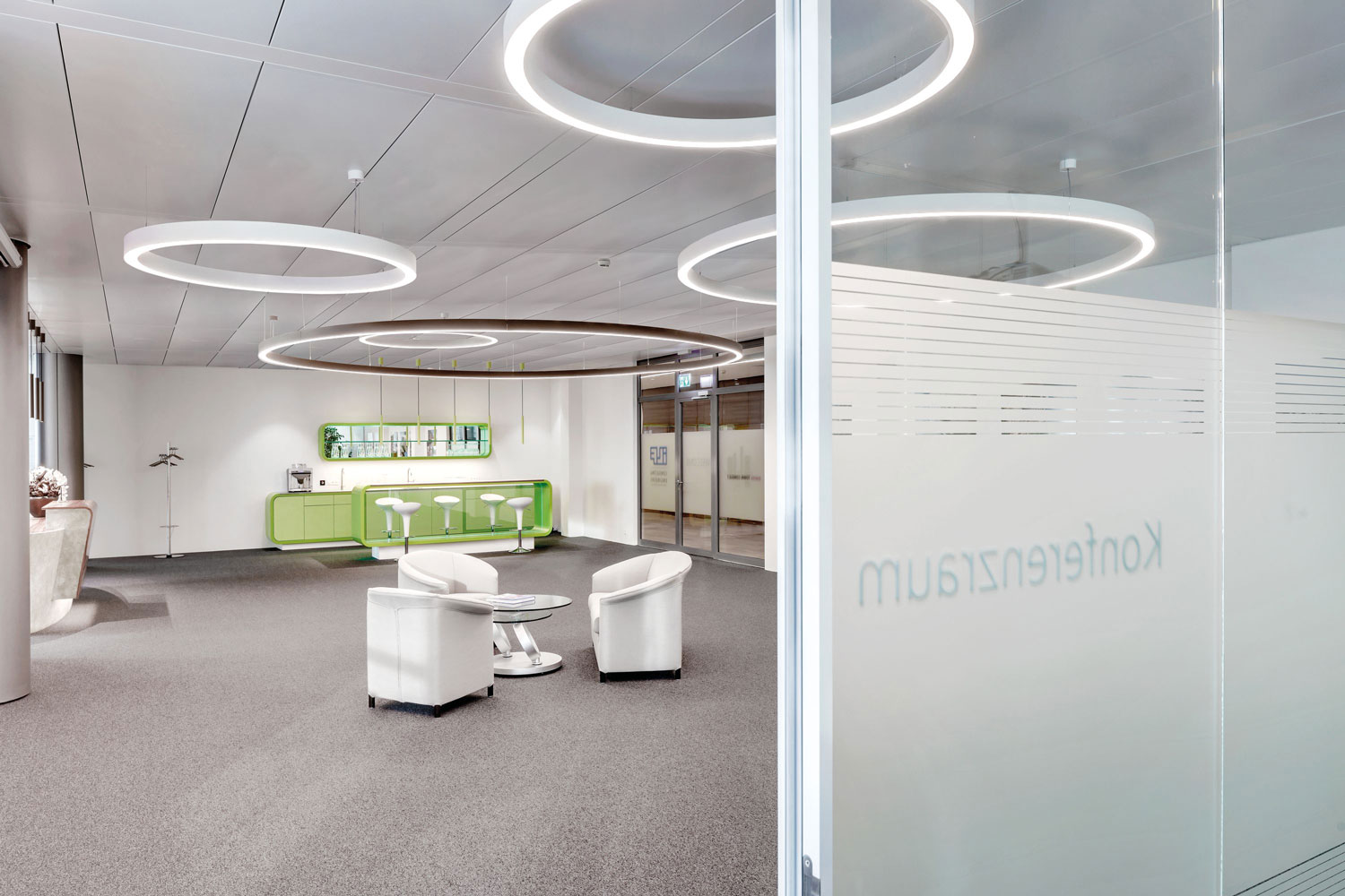 Various sizes of the Glorious Slim ring lights in black and white, elegant ceiling lighting for doctor's offices and conference rooms