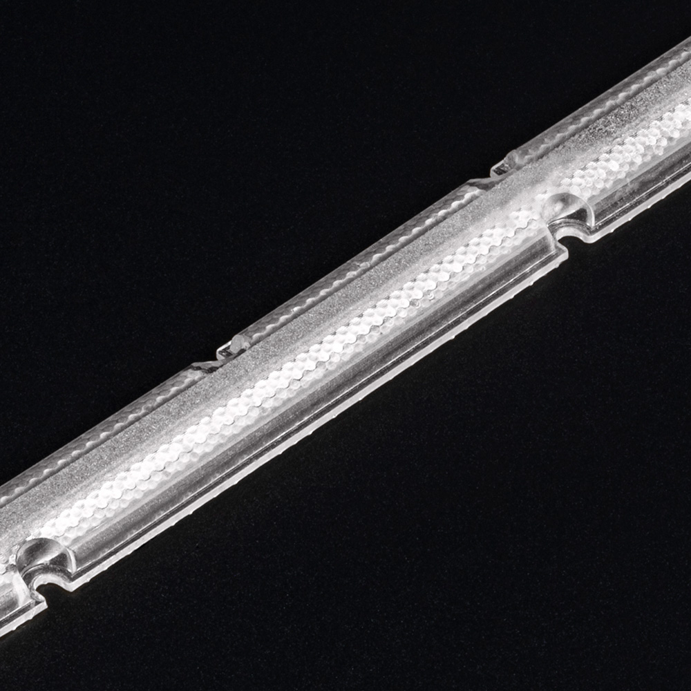 Batwing Lens development stage 7 – innovative micro-convex lens technology for precise light control. (Photo of lens)